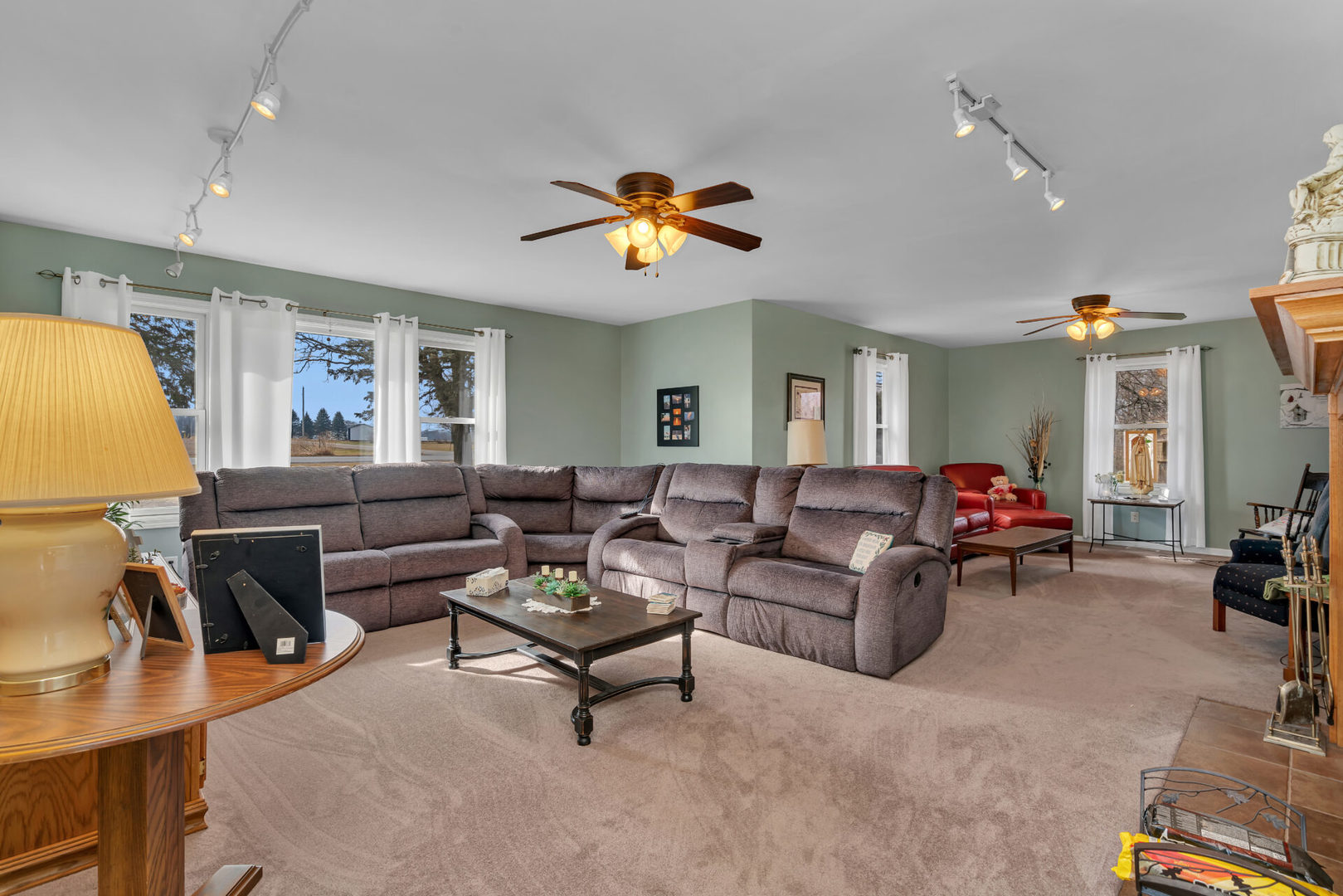 19556 West Manhattan Road Elwood, IL 60421 - Photo 9 of 23 a living room with furniture and a chandelier