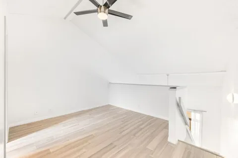 an aerial view of a house with a lake view