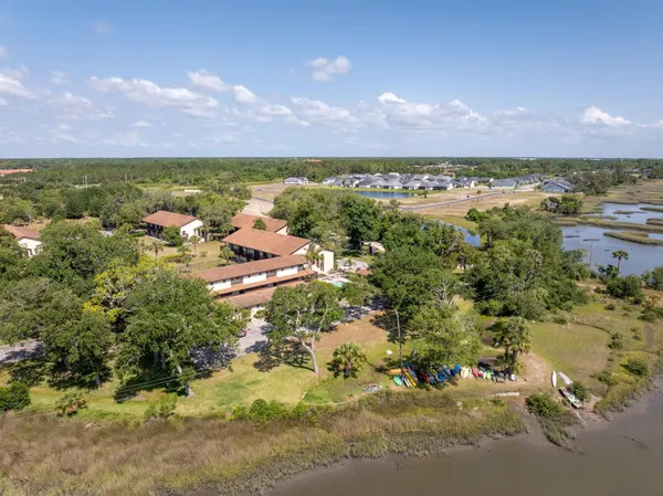 an aerial view of a house with a garden