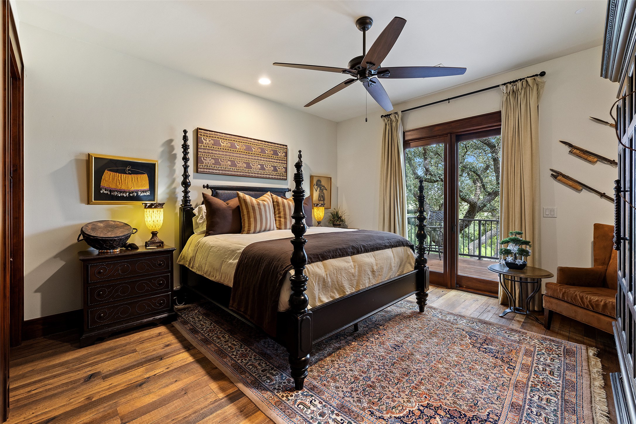 4529 Ranch Road 3347 Round Mountain, TX 78663 - Photo 13 of 36 a bedroom with a bed and wooden floor