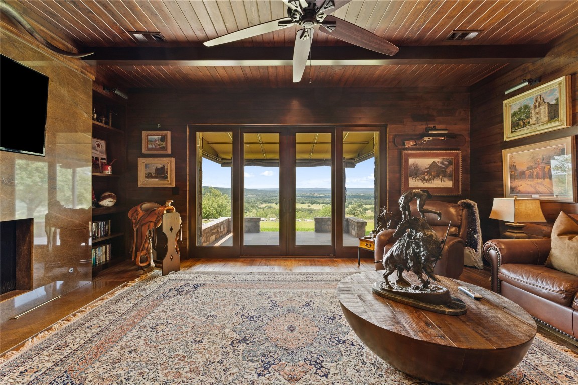 4529 Ranch Road 3347 Round Mountain, TX 78663 - Photo 15 of 36 a room with furniture and a large window