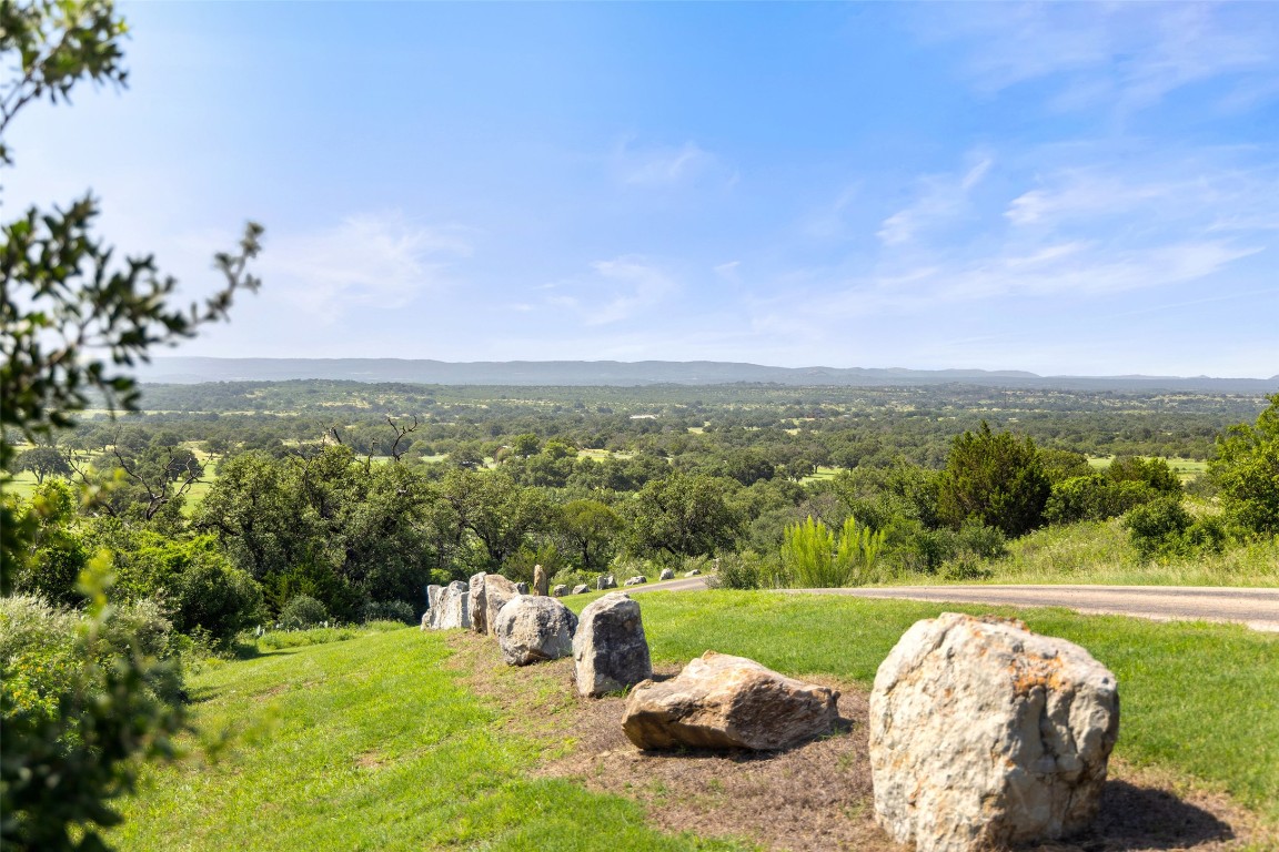 4529 Ranch Road 3347 Round Mountain, TX 78663 - Photo 21 of 36 a view of a lake with a yard