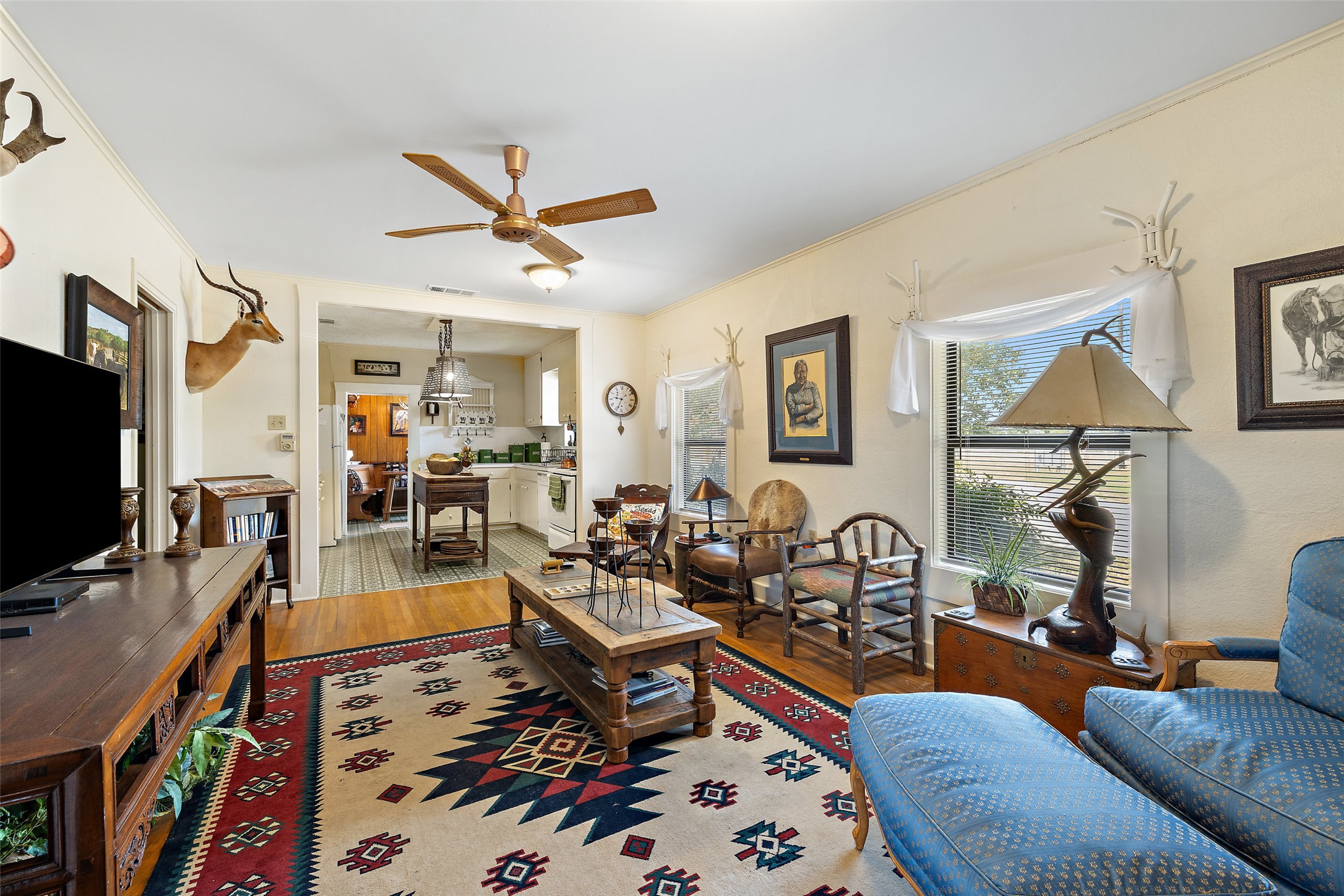 4529 Ranch Road 3347 Round Mountain, TX 78663 - Photo 29 of 36 a living room with furniture and a flat screen tv