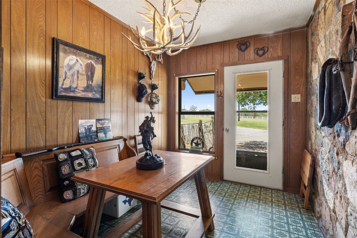 4529 Ranch Road 3347 Round Mountain, TX 78663 - Photo 30 of 36 a view of a dining room with furniture and window