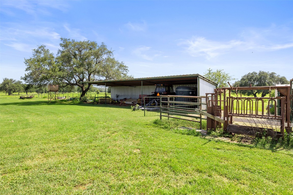 4529 Ranch Road 3347 Round Mountain, TX 78663 - Photo 36 of 36 a view of a house with a yard