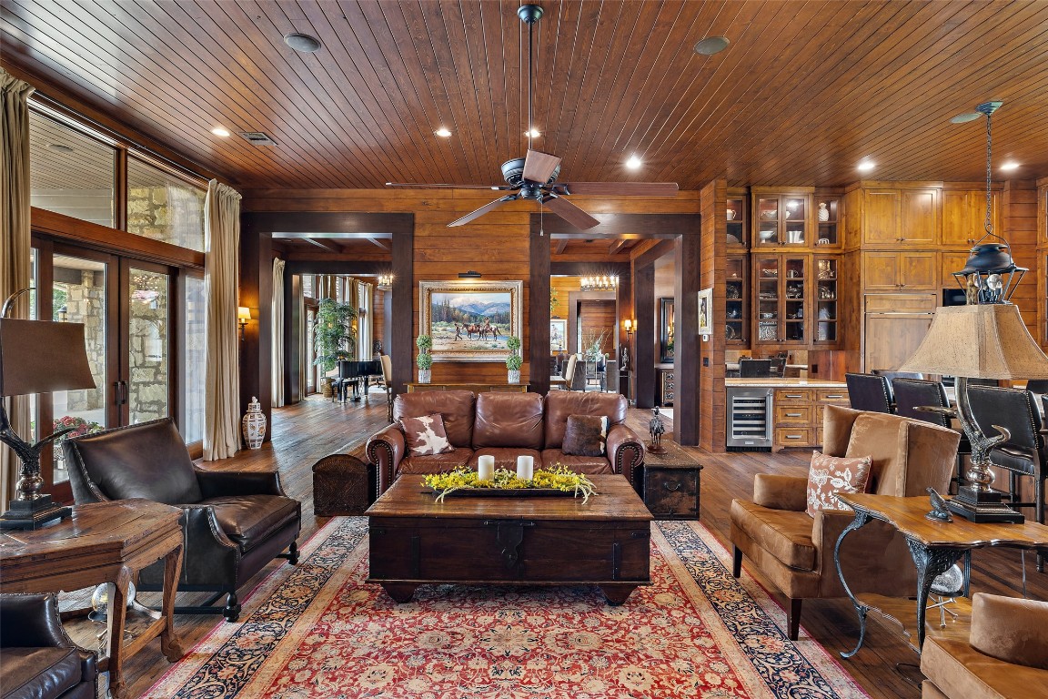 4529 Ranch Road 3347 Round Mountain, TX 78663 - Photo 10 of 36 a living room with furniture and a chandelier