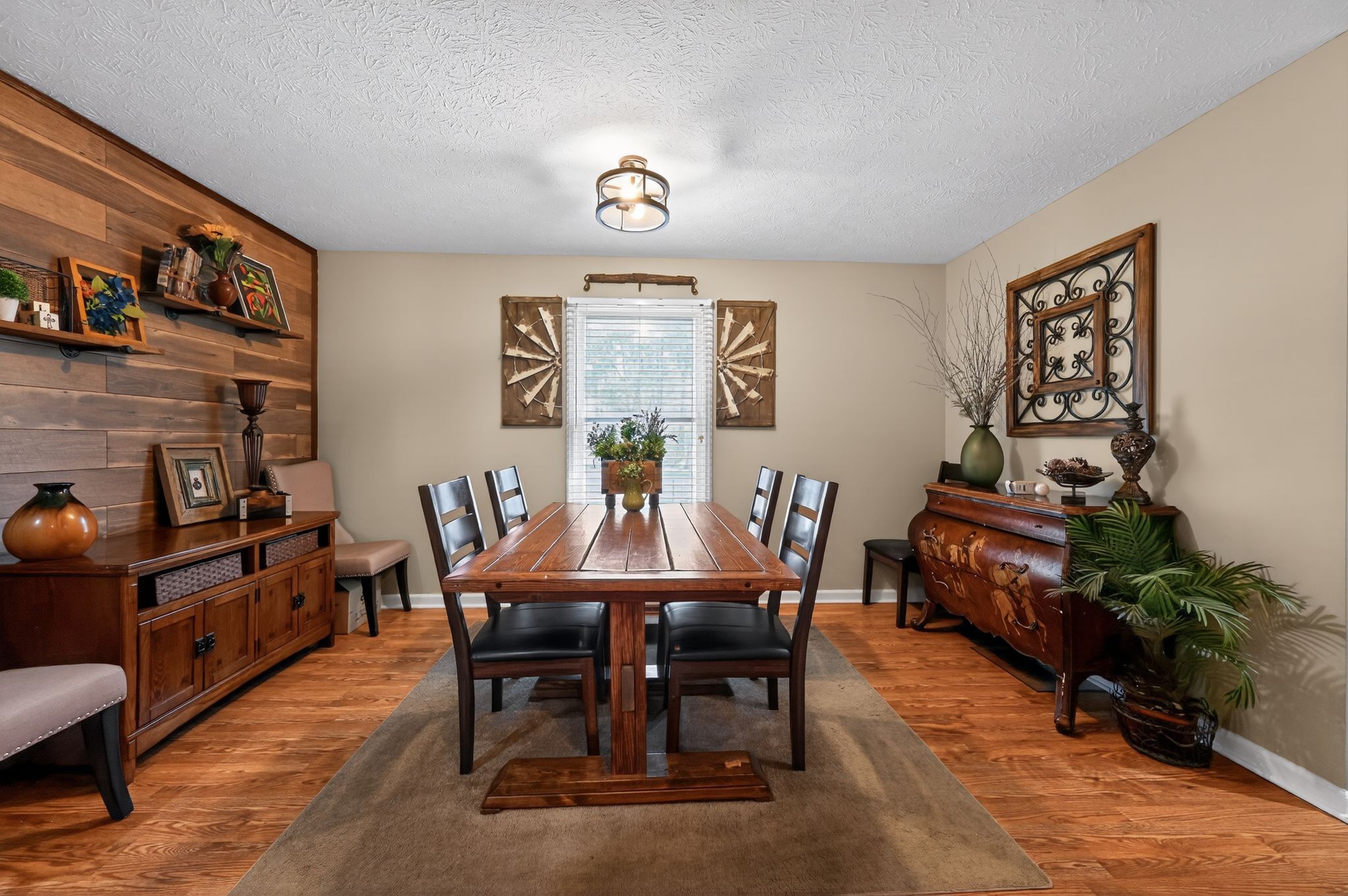 190 Hooper Road Smithville, TN 37166 - Photo 12 of 32 a view of a dining room with furniture window and wooden floor