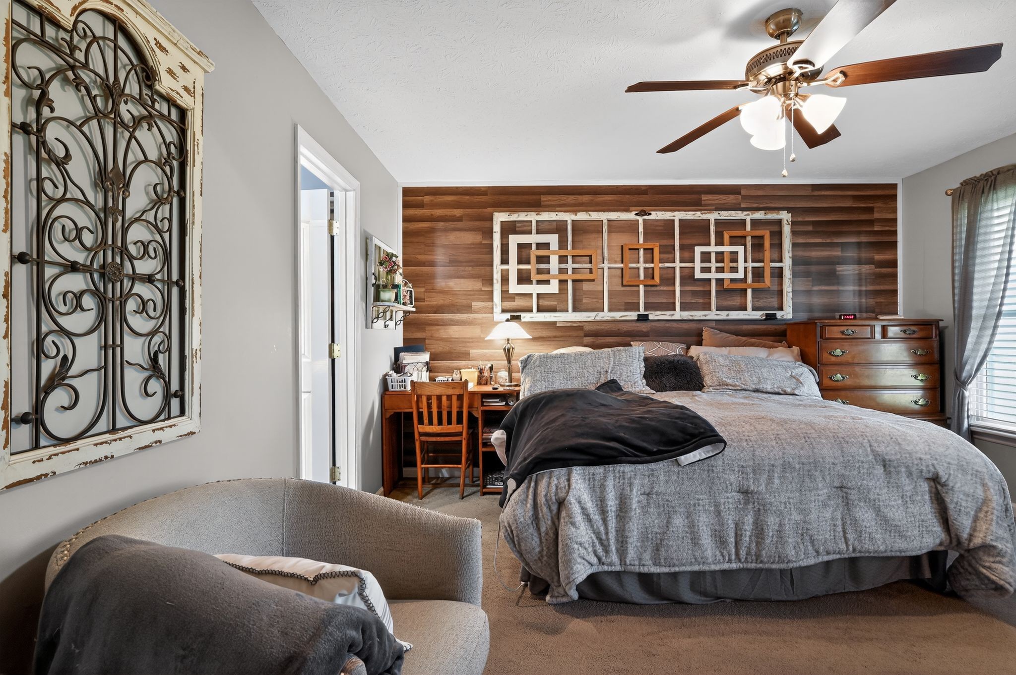 190 Hooper Road Smithville, TN 37166 - Photo 15 of 32 a bedroom with a bed and wooden floor