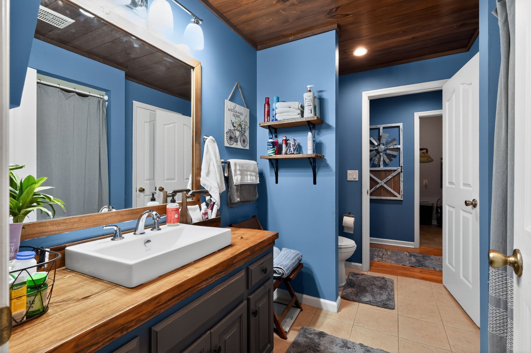 190 Hooper Road Smithville, TN 37166 - Photo 16 of 32 a bathroom with sink and a mirror