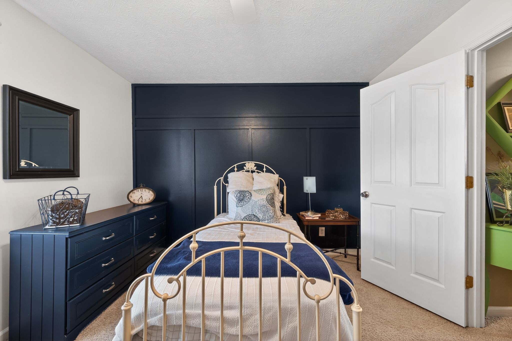 190 Hooper Road Smithville, TN 37166 - Photo 19 of 32 a bedroom with a bed and a dresser