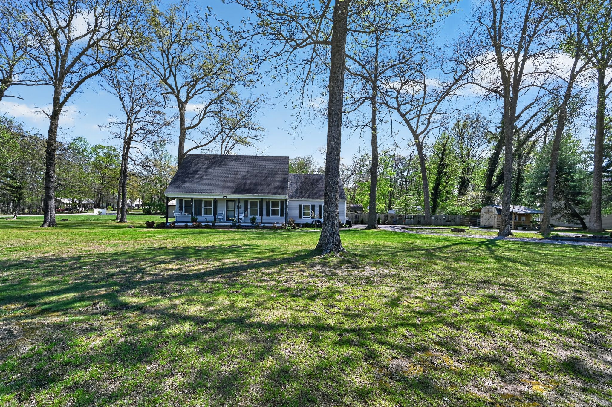 190 Hooper Road Smithville, TN 37166 - Photo 29 of 32 a view of a house with a yard