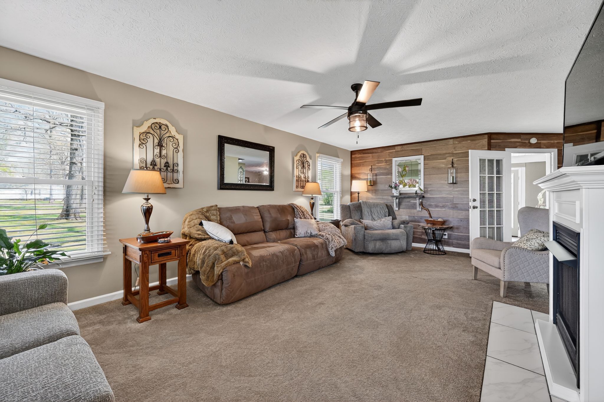 190 Hooper Road Smithville, TN 37166 - Photo 6 of 32 a living room with furniture and a fireplace