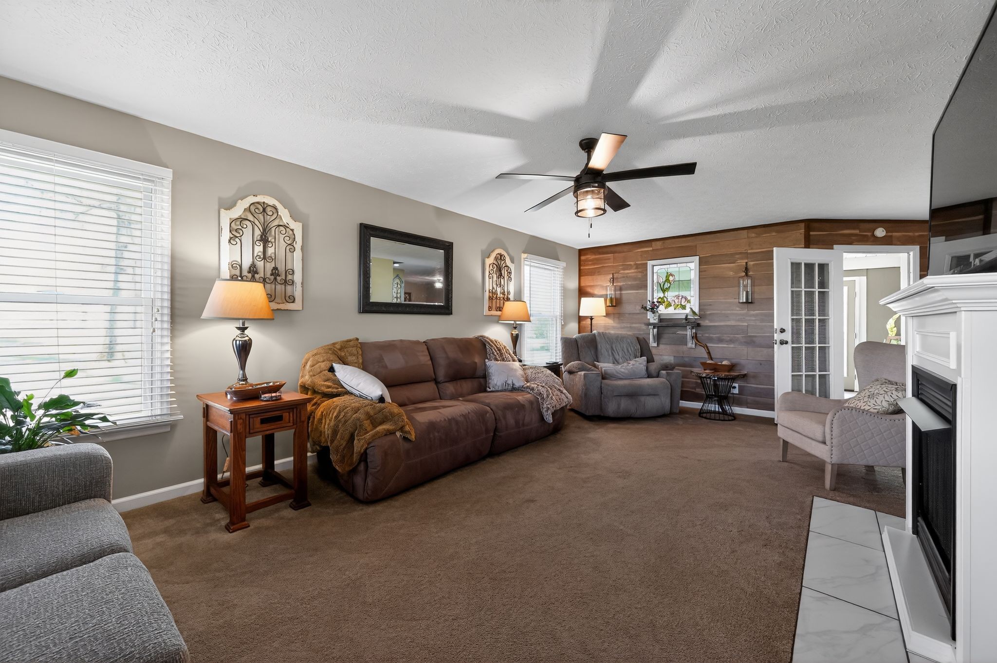 190 Hooper Road Smithville, TN 37166 - Photo 9 of 32 a living room with furniture and a fireplace