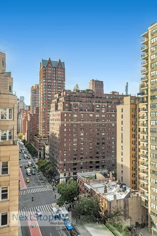 a view of a city with tall buildings