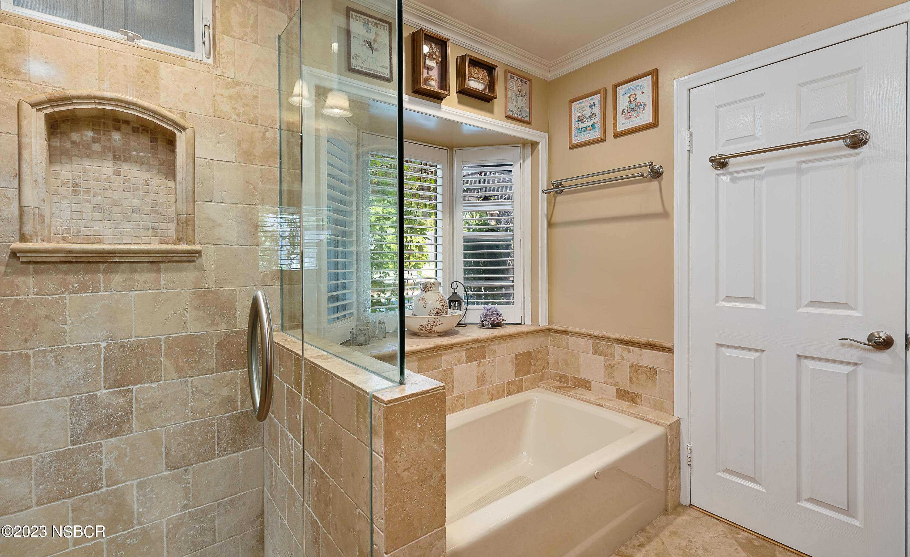 629 Wakefield Road Goleta, CA 93117 - Photo 13 of 22 a bathroom with a tub a sink and a shower