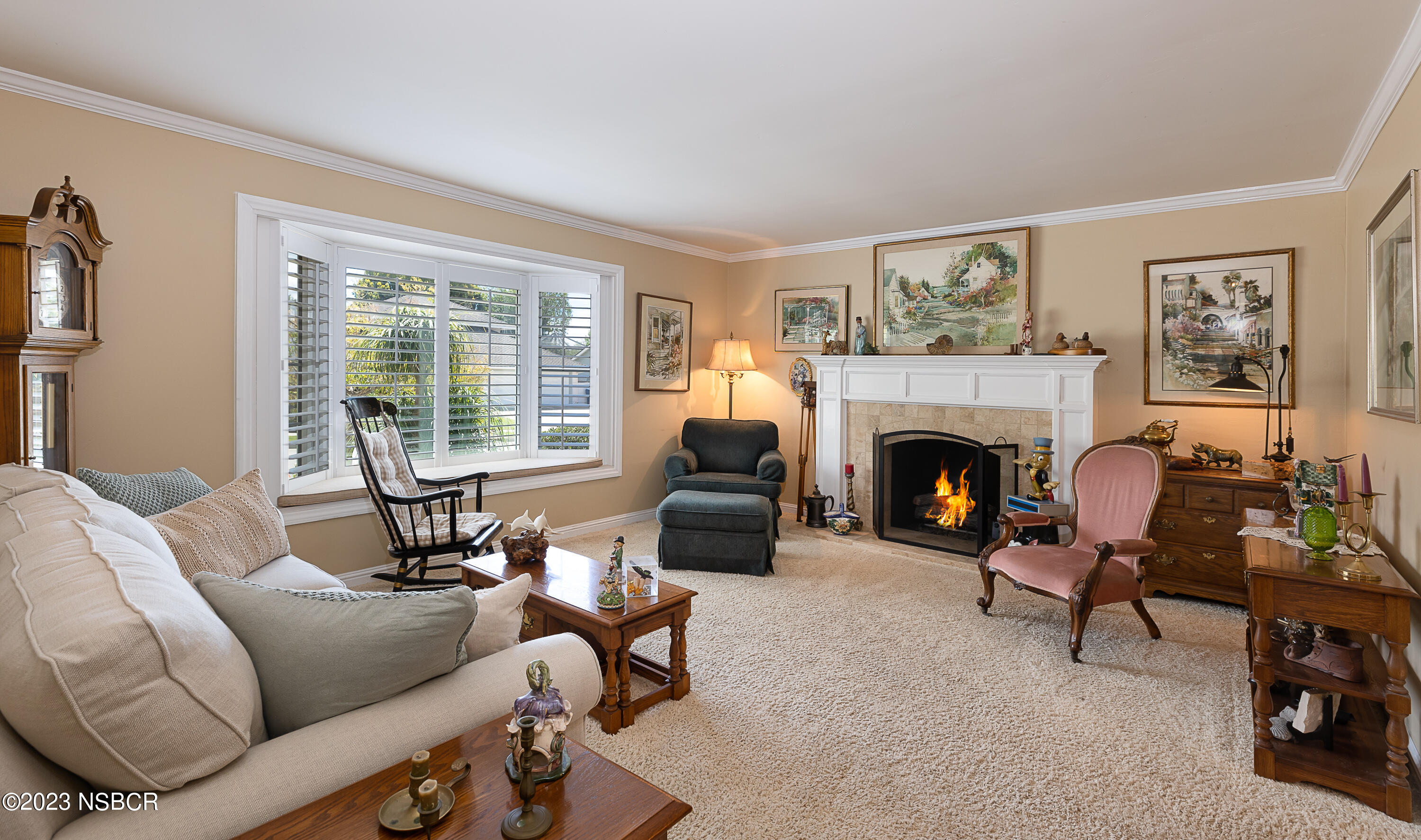 629 Wakefield Road Goleta, CA 93117 - Photo 4 of 22 a living room with furniture and a fireplace