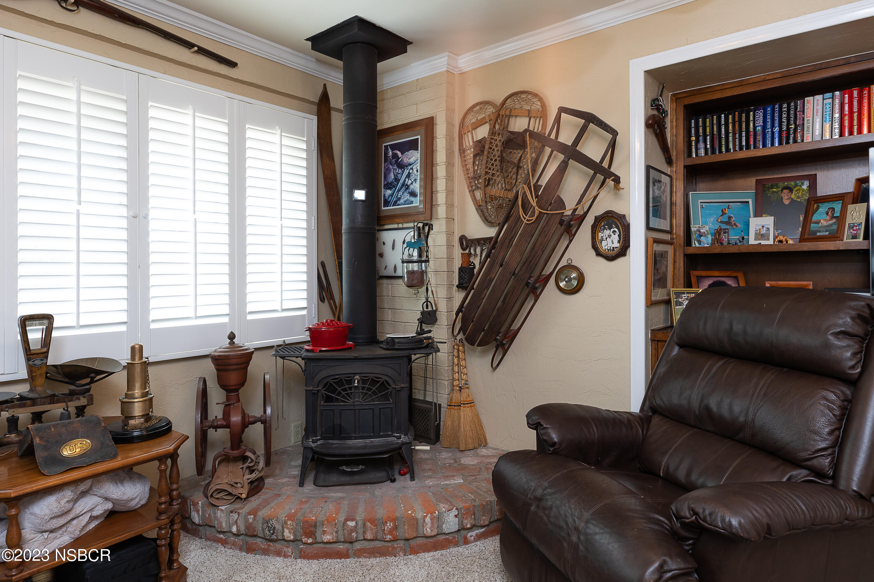 629 Wakefield Road Goleta, CA 93117 - Photo 10 of 22 a living room with furniture and a bookshelf