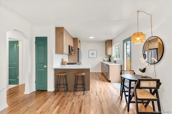 a view of kitchen with livingroom and furniture