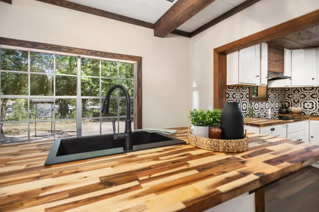 a view of a living room and bathroom
