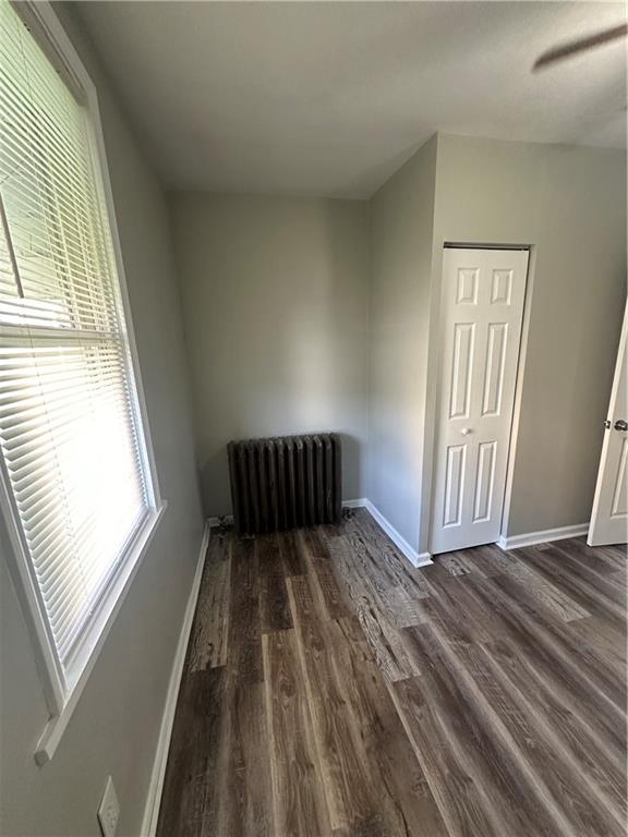 908 Russellwood Avenue McKees Rocks, PA 15136 - Photo 11 of 33 a view of a room with wooden floor and windows