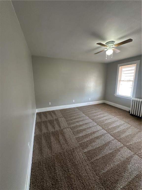 908 Russellwood Avenue McKees Rocks, PA 15136 - Photo 20 of 33 an empty room with windows and fan
