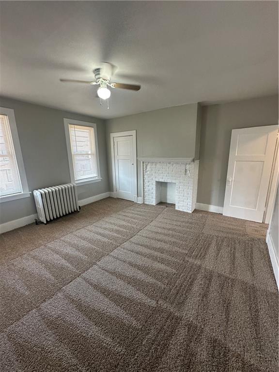 908 Russellwood Avenue McKees Rocks, PA 15136 - Photo 23 of 33 a spacious bedroom with a bed and a chandelier