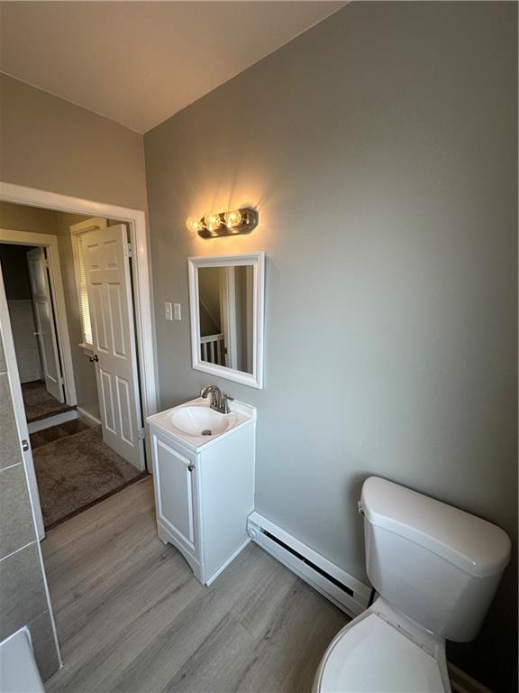 908 Russellwood Avenue McKees Rocks, PA 15136 - Photo 29 of 33 a bathroom with a toilet sink and mirror