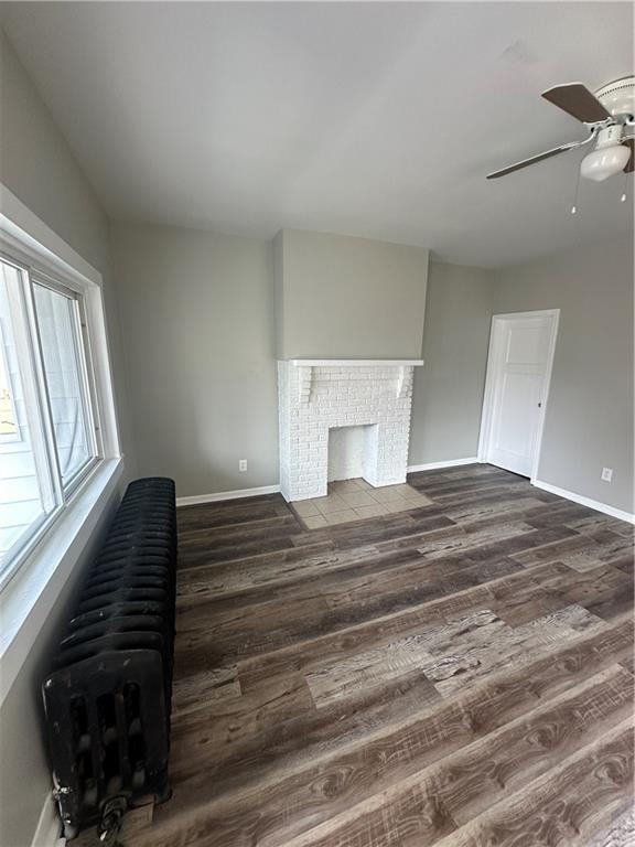 908 Russellwood Avenue McKees Rocks, PA 15136 - Photo 4 of 33 a bedroom with a bed and wooden floor