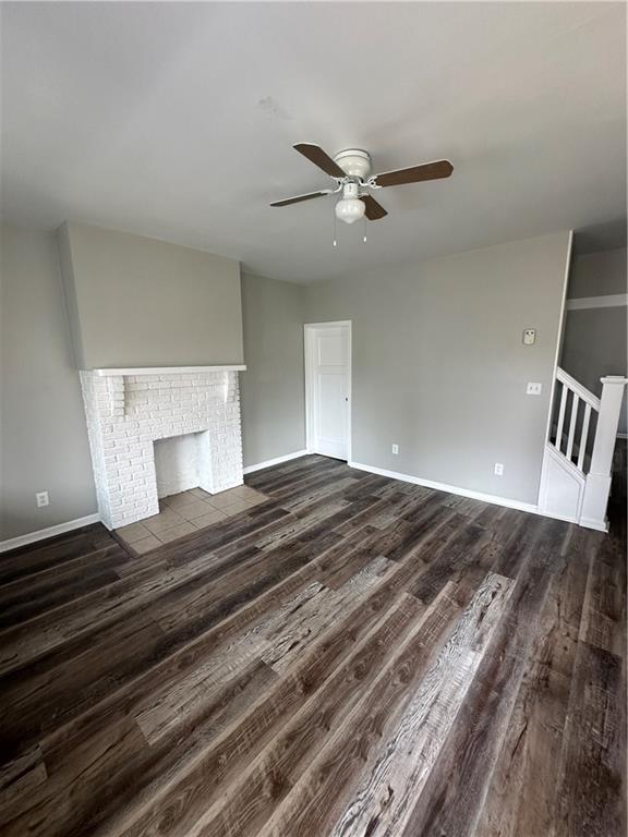 908 Russellwood Avenue McKees Rocks, PA 15136 - Photo 5 of 33 a bedroom with a bed and ceiling fan