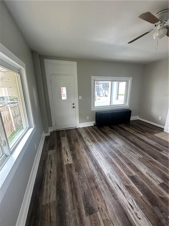 908 Russellwood Avenue McKees Rocks, PA 15136 - Photo 7 of 33 wooden floor in an empty room with a window