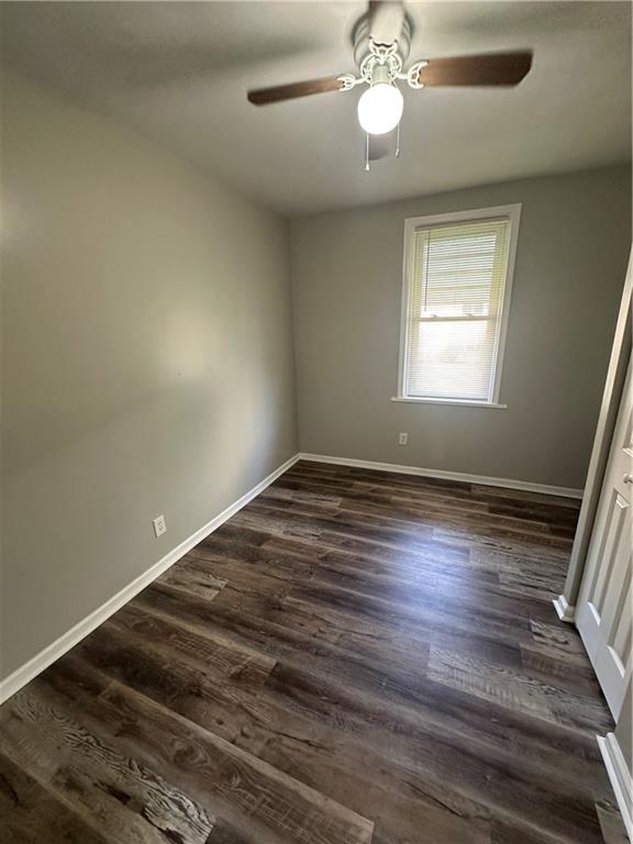 908 Russellwood Avenue McKees Rocks, PA 15136 - Photo 10 of 33 an empty room with wooden floor and windows