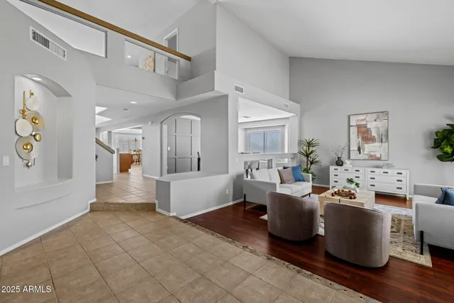 a room with furniture and pool table