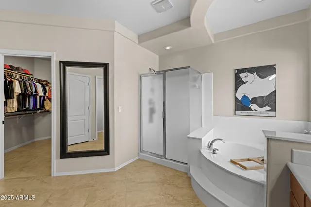 a view of a swimming pool with lounge chairs