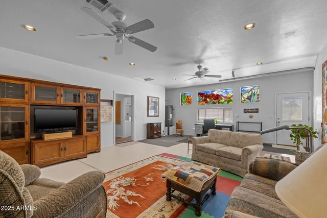 an aerial view of residential building with parking