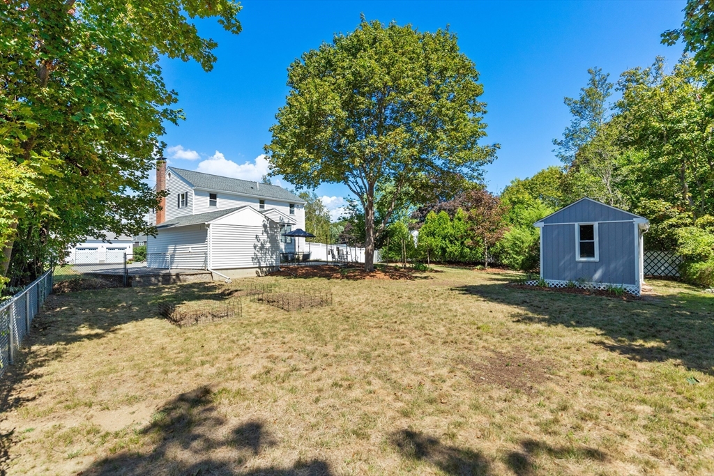 30 Samoset Road Woburn, MA 01801 - Photo 32 of 35 a view of a yard with a house