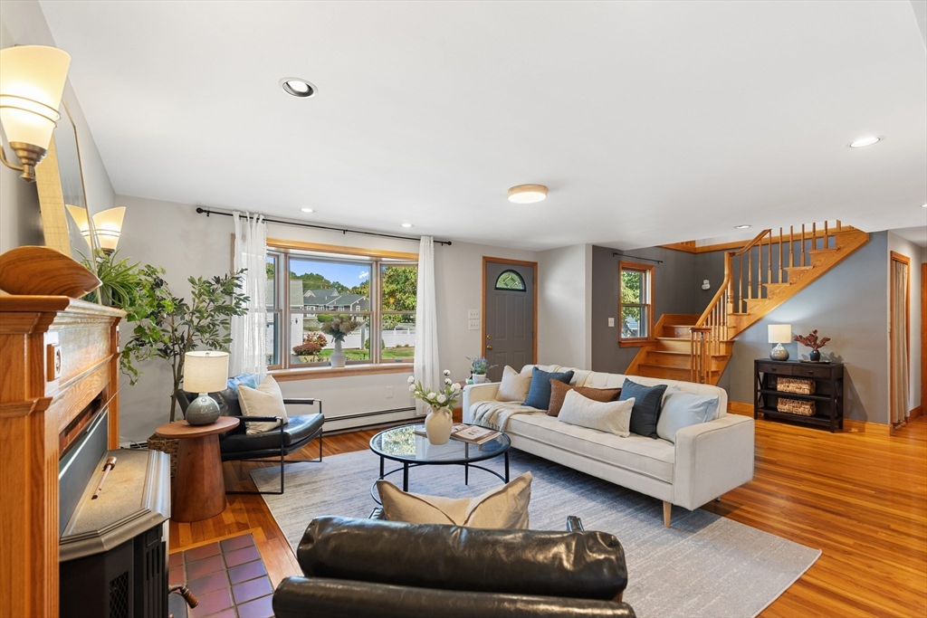 30 Samoset Road Woburn, MA 01801 - Photo 4 of 35 a living room with furniture and a large window