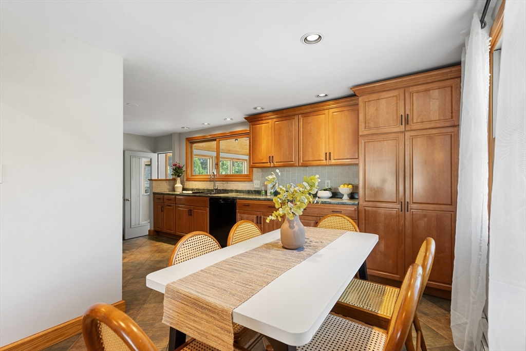 30 Samoset Road Woburn, MA 01801 - Photo 6 of 35 a view of a dining room with furniture and window