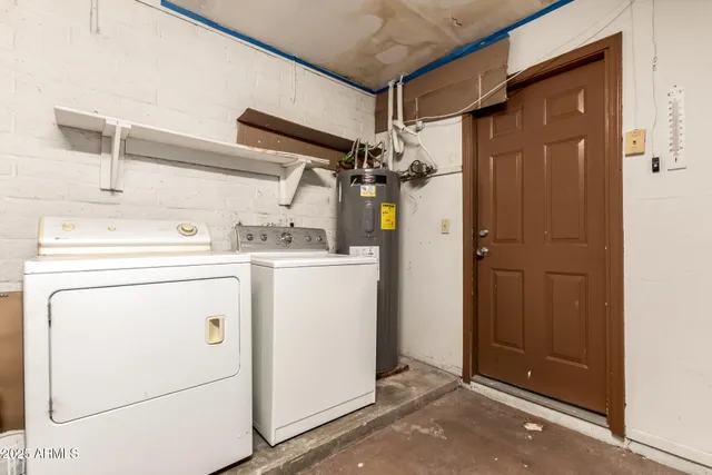 a view of an empty room with a fireplace