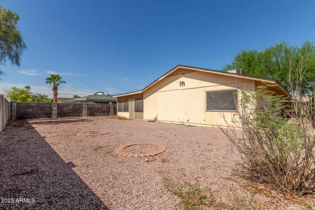 a house view with a garden space