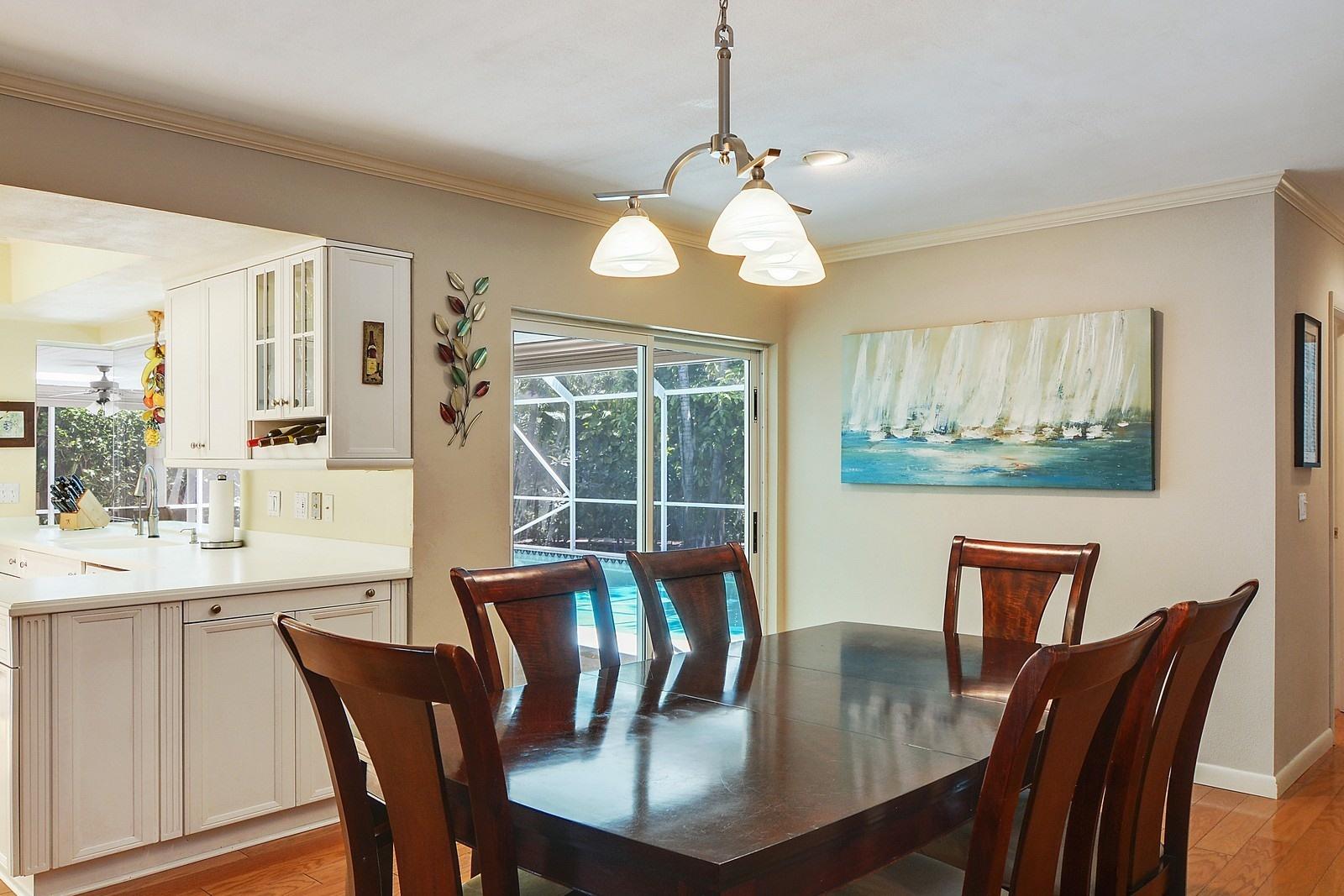 232 Cove Place Jupiter, FL 33469 - Photo 10 of 22 08_232CovePlace_369_DiningArea_Custom_Re