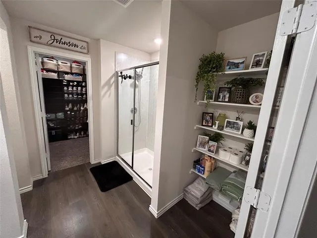 a white toilet sitting next to a toilet