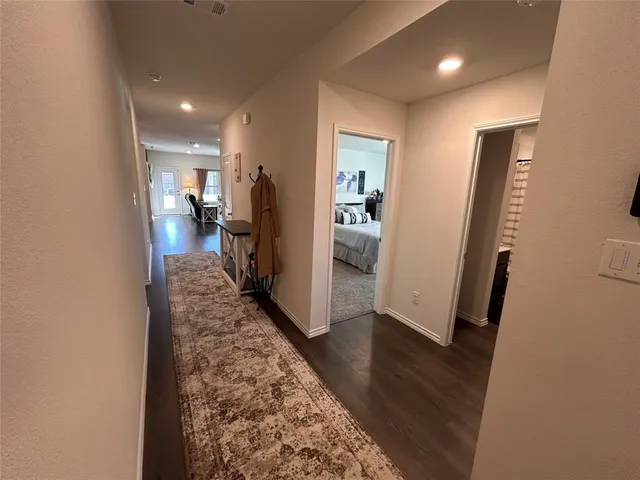 a view of a livingroom with furniture and closet