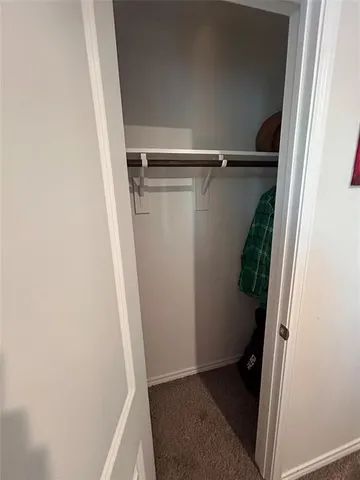 a bathroom with a sink and a shower curtain