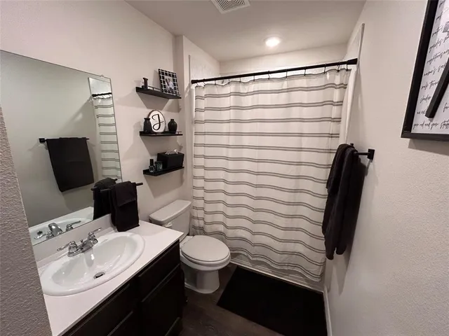 a hallway with washer and dryer