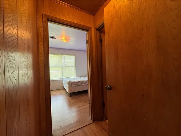 a view of a bathroom from the hallway
