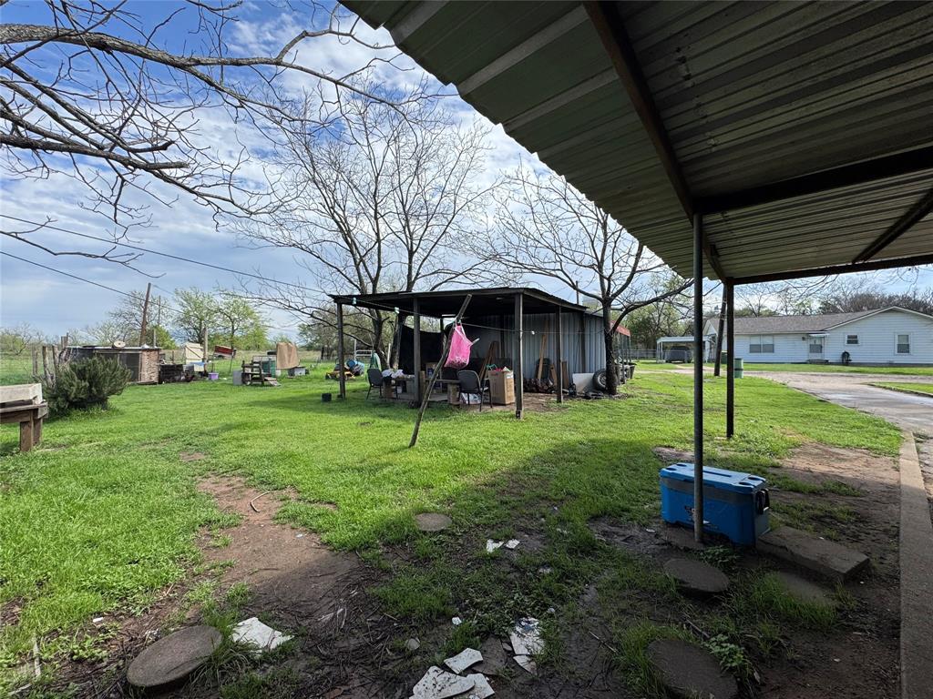 733 Foster Street Marlin, TX 76661 - Photo 35 of 40 a view of a house with a backyard