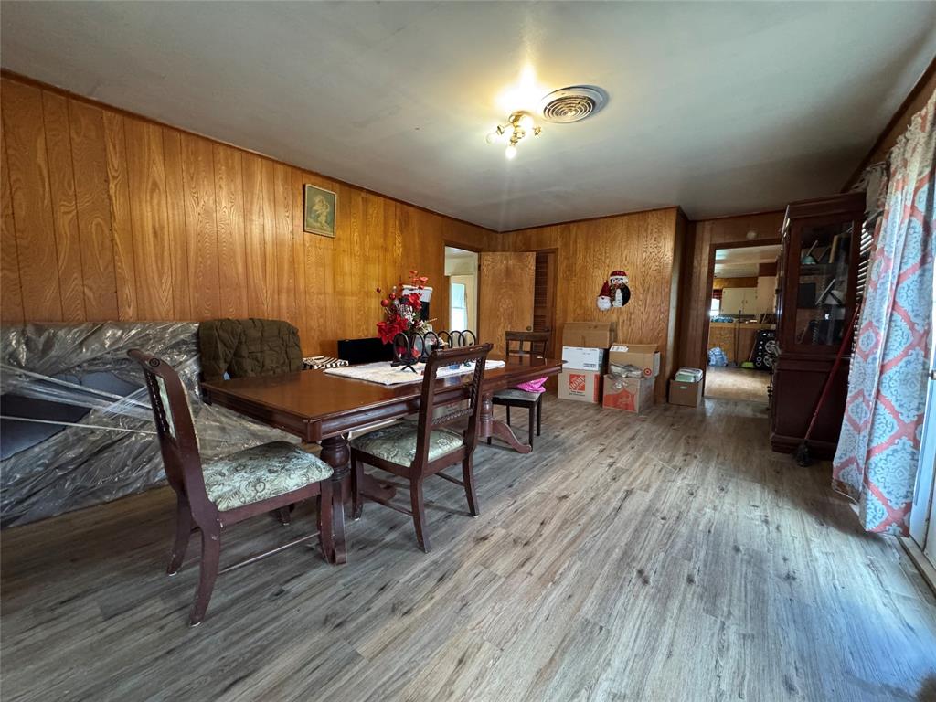 733 Foster Street Marlin, TX 76661 - Photo 7 of 40 a living room with furniture and a wooden floor