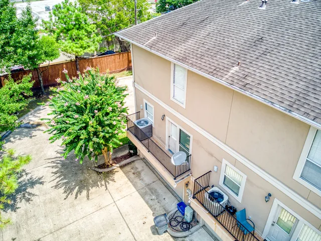 a house with trees in front of it