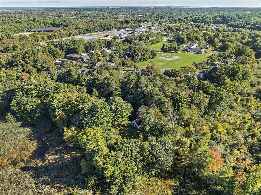 235 Main Street Marshfield, MA 02050 - Photo 11 of 15 an aerial view of residential houses with outdoor space and trees