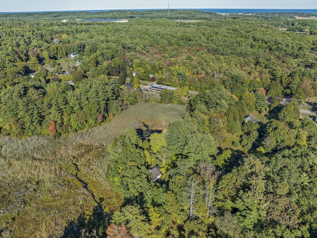 235 Main Street Marshfield, MA 02050 - Photo 9 of 15 a view of a lake with a garden